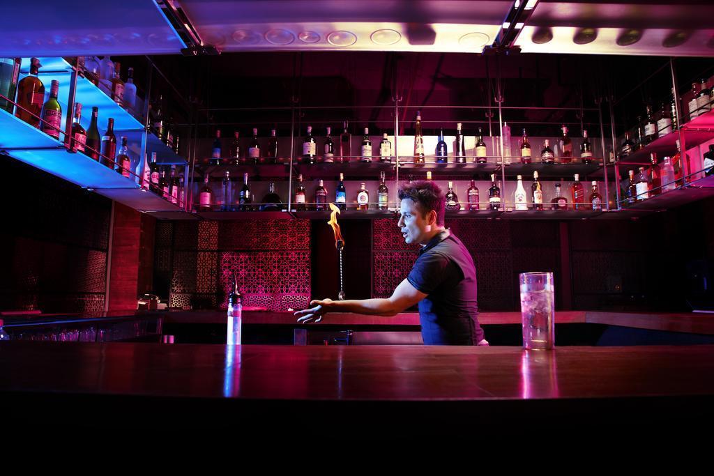 President - Ihcl Seleqtions Hotel Mumbai Exterior photo A bartender at work