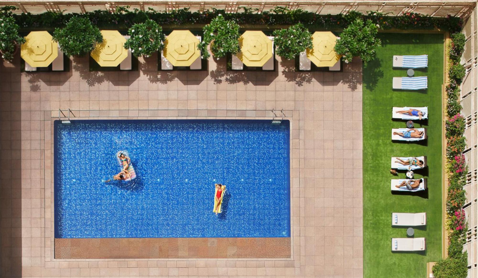 President - Ihcl Seleqtions Hotel Mumbai Exterior photo The pool at the 1018