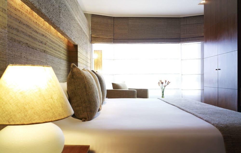 President - Ihcl Seleqtions Hotel Mumbai Exterior photo A bedroom at the Mandarin Oriental, Munich